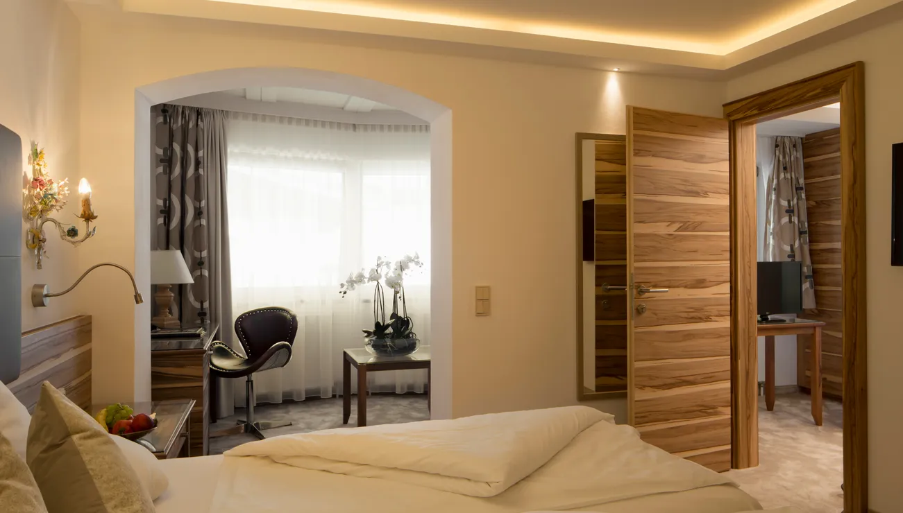 Schlafbereich im Familienappartement “Deluxe” im Hotel das Neuhaus
